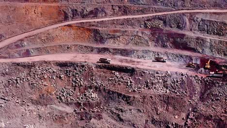 Panning-Drone-Shot-of-Dirt-Roads-And-Machines-at-Siana-Glod-and-Silver-mine,-Mainit,-Philippines