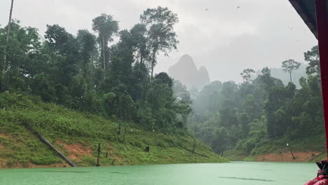 KHAO-SOK-National-Park-in-Southern-Thailand-raining-day-from-boat-ferry-adventure-tour