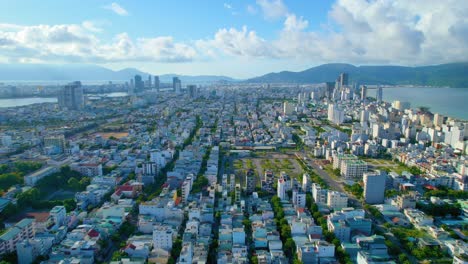Aerial-Establishing-Shot-Urban-Vietnamese-Cityscape-Son-Tra,-Da-Nang,-Vietnam