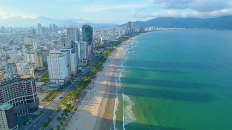Aerial-Idyllic-Vietnamese-Beach-Coast-Hotels-And-Resorts-My-Khe,-Da-Nang,-Vietnam