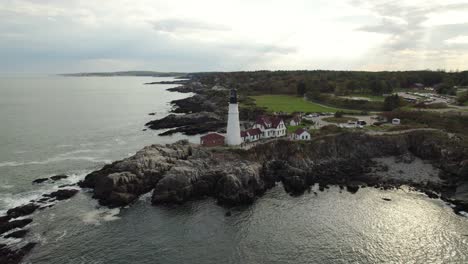 Aerial-Drone-Shot-Circling-Historic-Maine-Lighthouse