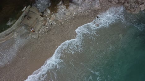 Aerial-straight-down-view-of-the-coast-line-on-a-Croatian-beach