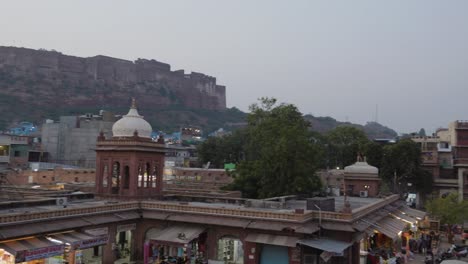 city-construction-with-ancient-fort-background-at-day-form-flat-angle-video-is-taken-at-sardar-market-ghantaGhar-jodhpur-rajasthan-india