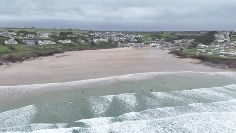 Polzeath-beach-Cornwall-UK-pull-back-drone-aerial-reverse-reveal