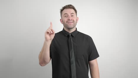 man-in-black-shirt-gets-an-idea-on-a-white-background