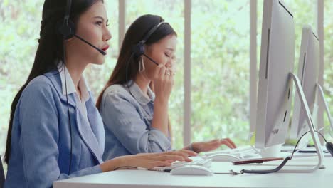 Customer-support-agent-or-call-center-with-headset-talking-to-customer-on-phone.