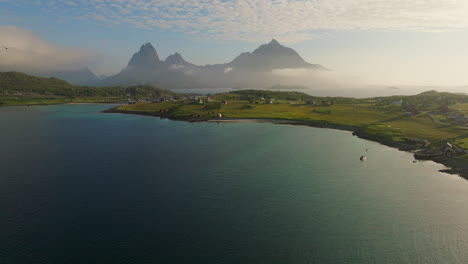 Panoramic-aerial-overview-of-Holdoya-Lofoten-Norway-bay-at-mystical-golden-hour