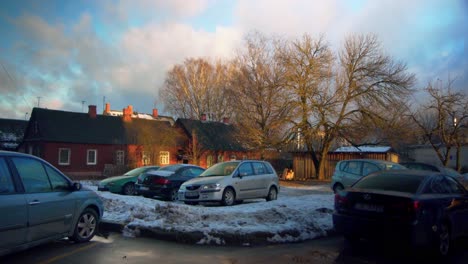 Second-hand-cars-on-a-parking-lot-covered-with-snow-in-residential-area