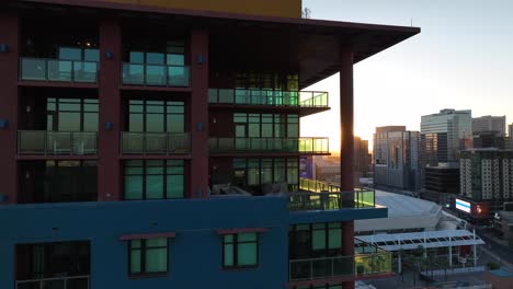 Modern-apartment-building-in-downtown-Phoenix,-Arizona-during-golden-hour-sunset