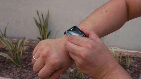 Man-Using-A-Digital-Smartwatch-During-Workout
