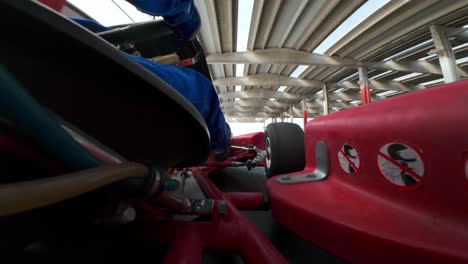 Camera-point-of-view-mounted-on-Go-Kart-lateral-side-during-race-on-indoor-and-outdoor-track