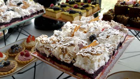Dessert-table-featuring-a-flaky-pastry-with-a-fruity-base