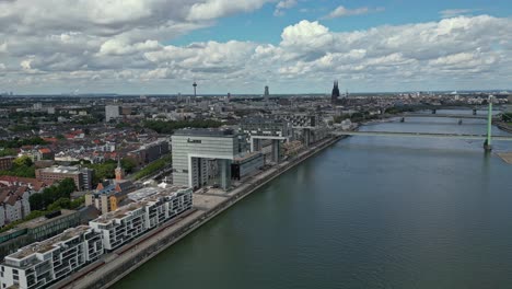 View-of-bridges-crossing-the-River-Rhine,-Cologne-cityscape-and-blue-sky