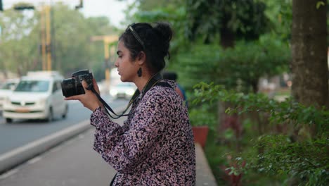 Middle-Shot-of-Professional-Young-Indian-Photographer-on-the-Streets