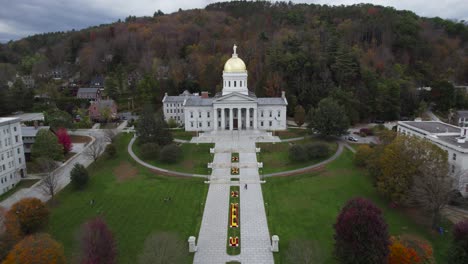 Aerial-fall-forward-shot-of-Vermont-State-House-and-pathway-near-hillside