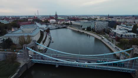 Drone-flight,-Wroclaw-Grunwald-bridge,-known-as-Most-Grunwaldzki-in-Polish,-Poland