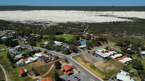 Panoramic-aerial-view-of-Lancelin-town,-Australian-tourist-and-fishing-town-at-the-shore-of-Indian-Ocean,-Perth,-Western-Australia