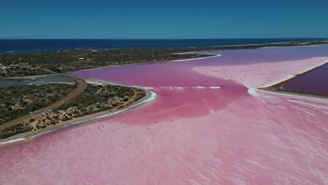 Aerial-view-of-the-scenic-landscape-of-Hutt-Lagoon-Pink-Lake,-Hutt-Lagoon-Marine-Salt-Lake-on-Coral-Coast-near-Port-Gregory,-Australia