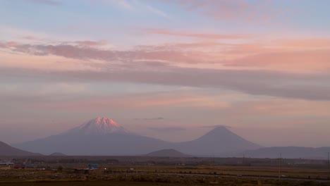 Agri-Ararat-Mountain-Turkey-Armenia-Iran-border-snow-capped-high-altitude-in-twilight-pink-sky-blue-clods-in-horizon-after-sunset-before-sunrise-natural-landscape-of-beautiful-wonderful-scenic-shot