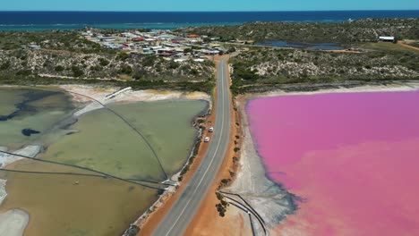 Drone-shot-of-the-Hutt-Lagoon-Pink-Lake-landscape,-Hutt-Lagoon-Marine-Salt-Lake-on-Coral-Coast-near-Port-Gregory,-Scenic-travel-and-tourist-destination,-Australia