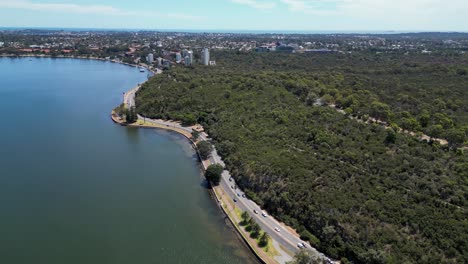 Aerial-view-of-Mount-Bay-Road-parallel-to-Swan-River,-Inner-city-parks-and-rich-cultural-heritage-site-Kings-Park-overlooking-Perth-Water,-Perth,-Western-Australia