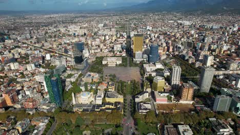 Panoramic-Aerial-View-Capture-the-Vibrancy-of-Tirana's-Capital,-Showcasing-Center,-Buildings,-Streets,-and-Charming-Neighborhoods