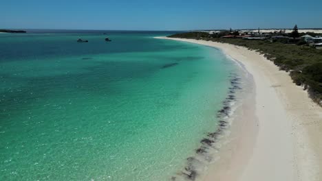 Aerial-view-of-pristine-Lancelin-Beach-crystal-clear-turquoise-water-and-white-sand-landscape,-Western-Australia