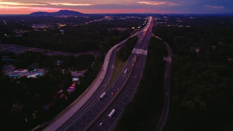 Marietta,-Georgia-traffic-flow-on-I-75,-evening-with-Kennesaw-Mountain-Summit-background