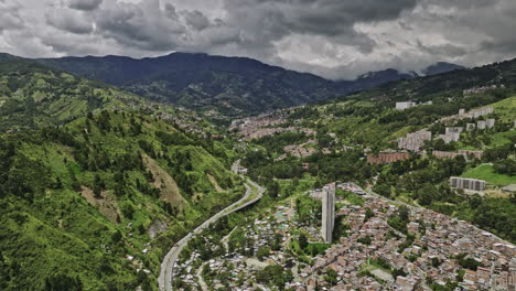 Medellin-Colombia-Aerial-v25-panning-view-drone-flyover-Mirador-El-Cristo-capturing-hillside-residential-cityscape-across-San-Cristobal-and-Comuna-7-Robledo---Shot-with-Mavic-3-Cine---November-2022