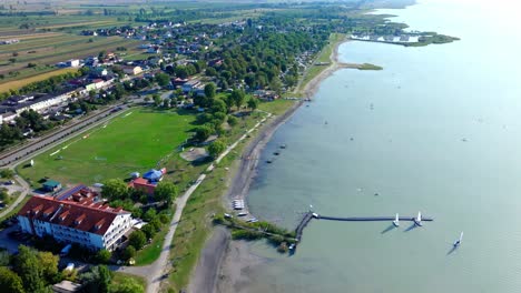 Lakeside-Beach-And-Pier-On-The-Shore-Of-Lake-Neusiedl-In-Austria