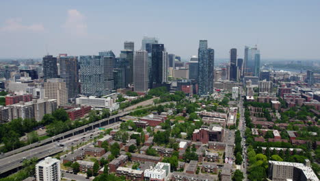 Aerial-view-of-the-Boulevard-Ville-Marie-and-the-Montreal-skyline,-in-Canada