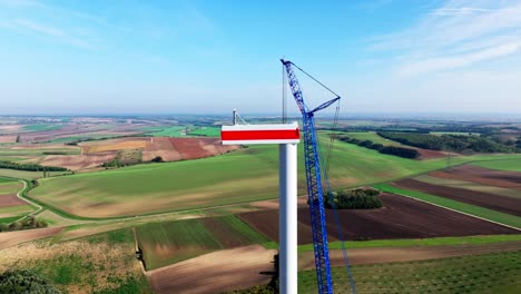 Tower-and-Nacelle-Of-Wind-Turbine-Under-Construction-With-A-Crane-At-Wind-Farm