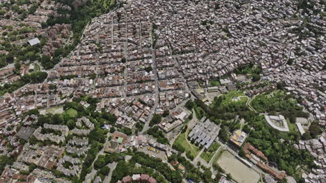 Medellin-Colombia-Aerial-v35-birds-eye-view-flyover-Comuna-13-San-Havier-capturing-residential-hillside-across-Veinte-De-Julio,-La-Independencia-and-Belencito---Shot-with-Mavic-3-Cine---November-2022