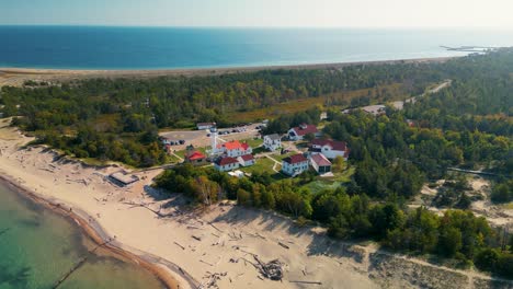 Aerial-view-of-Whitefish-Point-Lighthouse-and-Great-Lakes-Shipwreck-Museum,-Michigan