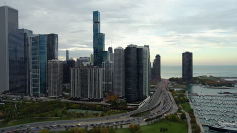 Aerial-view-of-high-rise-condos-on-the-lakefront,-fall-sunset-in-Chicago,-USA