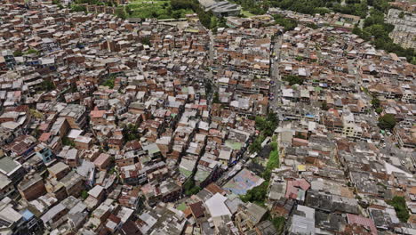 Medellin-Colombia-Aerial-v36-birds-eye-view-flyover-capturing-densely-populated-residential-hillside-of-Comuna-13-San-Javier-with-houses-on-steep-slope---Shot-with-Mavic-3-Cine---November-2022