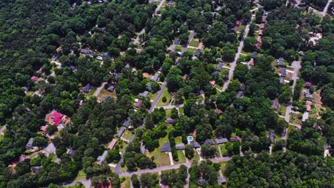 Aerial-top-down-shot-of-Stone-Mountain-Neighborhood-with-green-trees-during-sunny-day,-Georgia,-USA---Atlanta-City-Suburb-Area