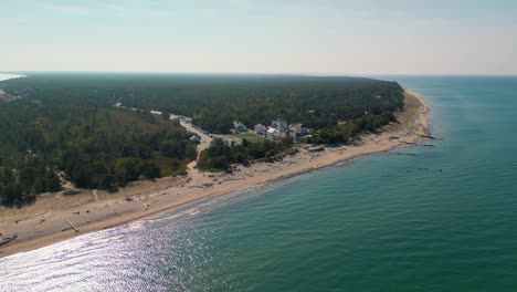 Aerial-view-of-Whitefish-Point-Lighthouse-and-Great-Lakes-Shipwreck-Muscum,-Michigan
