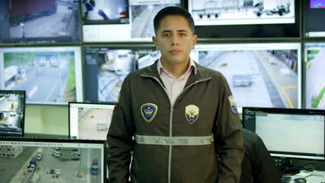 portrait-shot-of-a-surveillance-officer-in-the-control-room