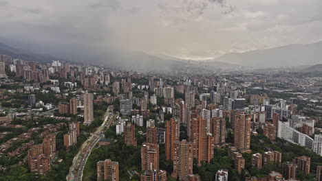 Medellin-Colombia-Aerial-v5-panoramic-views-drone-flyover-La-Florida-capturing-full-cityscape-across-hillside-El-Poblado,-Patio-Bonito-and-airport-views---Shot-with-Mavic-3-Cine---November-2022