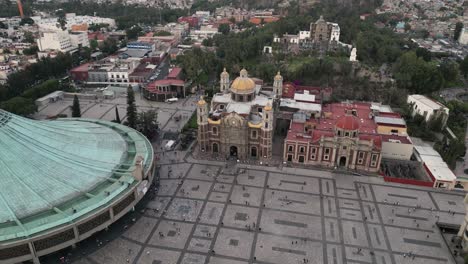 The-sacred-villa-basilica-of-Guadalupe-from-drone-video,-its-churches-and-atrium-from-above