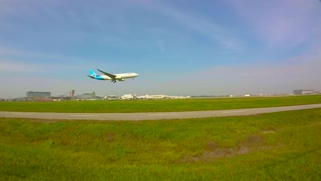 slow-motion-view-of-a-plane-landing-at-Montreal-airport,-Canada