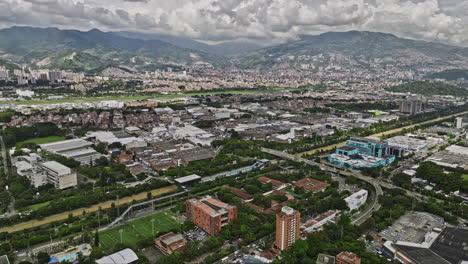 Medellin-Colombia-Aerial-v12-flyover-Patio-Bonito-and-Astorga-capturing-riverside-cityscape-across-Guayabal,-Campo-Amor,-Manila,-Villa-Carlota-and-Santa-Fe---Shot-with-Mavic-3-Cine---November-2022