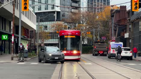 Red-TTC-Streetcar-tram-NOT-IN-SERVICE-stopped-in-Toronto,-transportation-delay