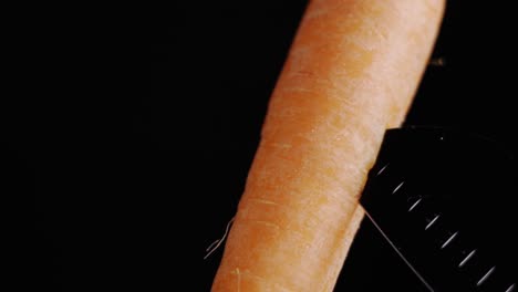 Carrot-in-black-background-close-up-view