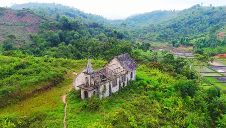 Old-church-with-broken-roof-in-the-middle-of-the-green-jungle