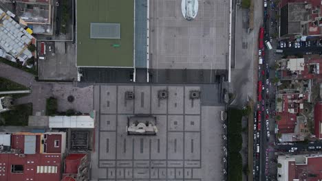 Drone-video-from-a-bird's-eye-view-of-the-Atrium-of-the-Americas-of-the-Villa-Basilica-of-Guadalupe,-you-can-see-the-Virgin-painted-on-the-floor