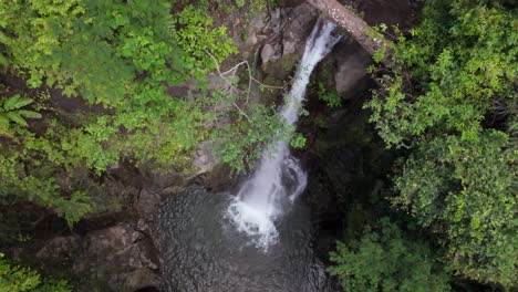 Aerial-View-of-Tropical-Waterfall-in-Alegria,-Philippines