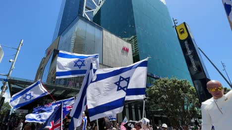 Demonstrators-hold-Israel-and-New-Zealand-Flags-at-anti-Palestine-protest