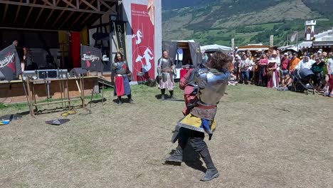 A-sword-fighting-scene-performed-by-Burdyri,-a-professional-sword-and-stage-combat-team,-during-the-South-Tyrolean-Medieval-Games-2023